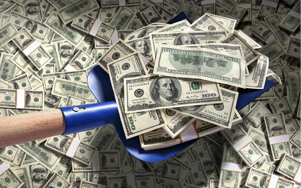 shovelingmoney.jpg