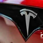tesla-logo-happy_coin_news.webp.webp